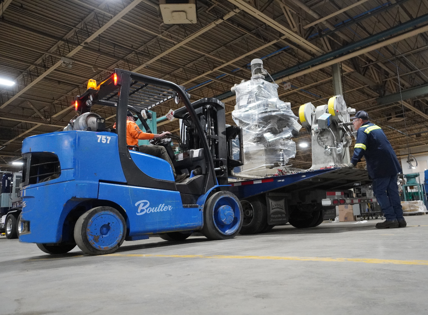 Moving heavy machinery into building
