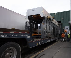 Moving large palletizer inside Genesee Brewery