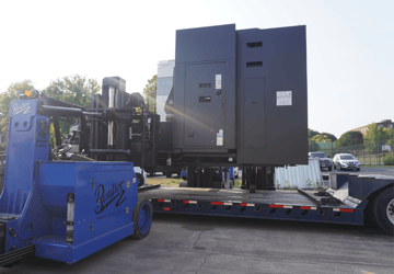 Unloading a large machine for a Rochester, New York manufacturer