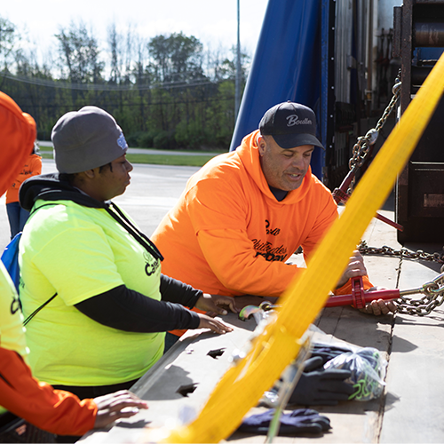 Field technician with high schooler