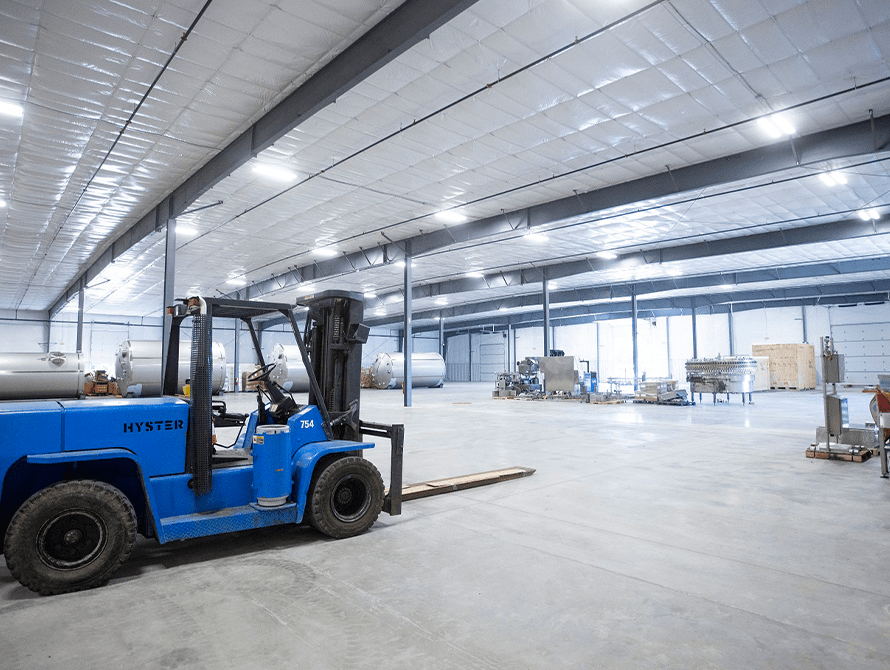 Forklift in warehousing space-min