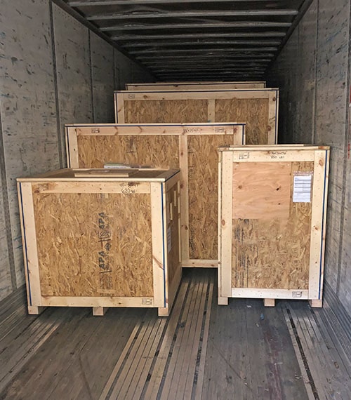 crates in trailer-min