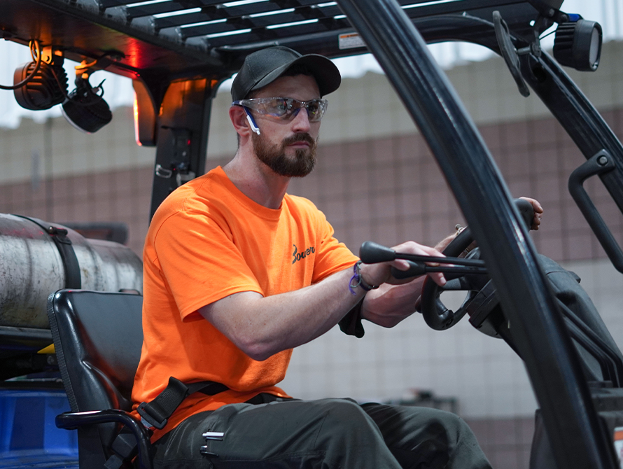 worker on forklift