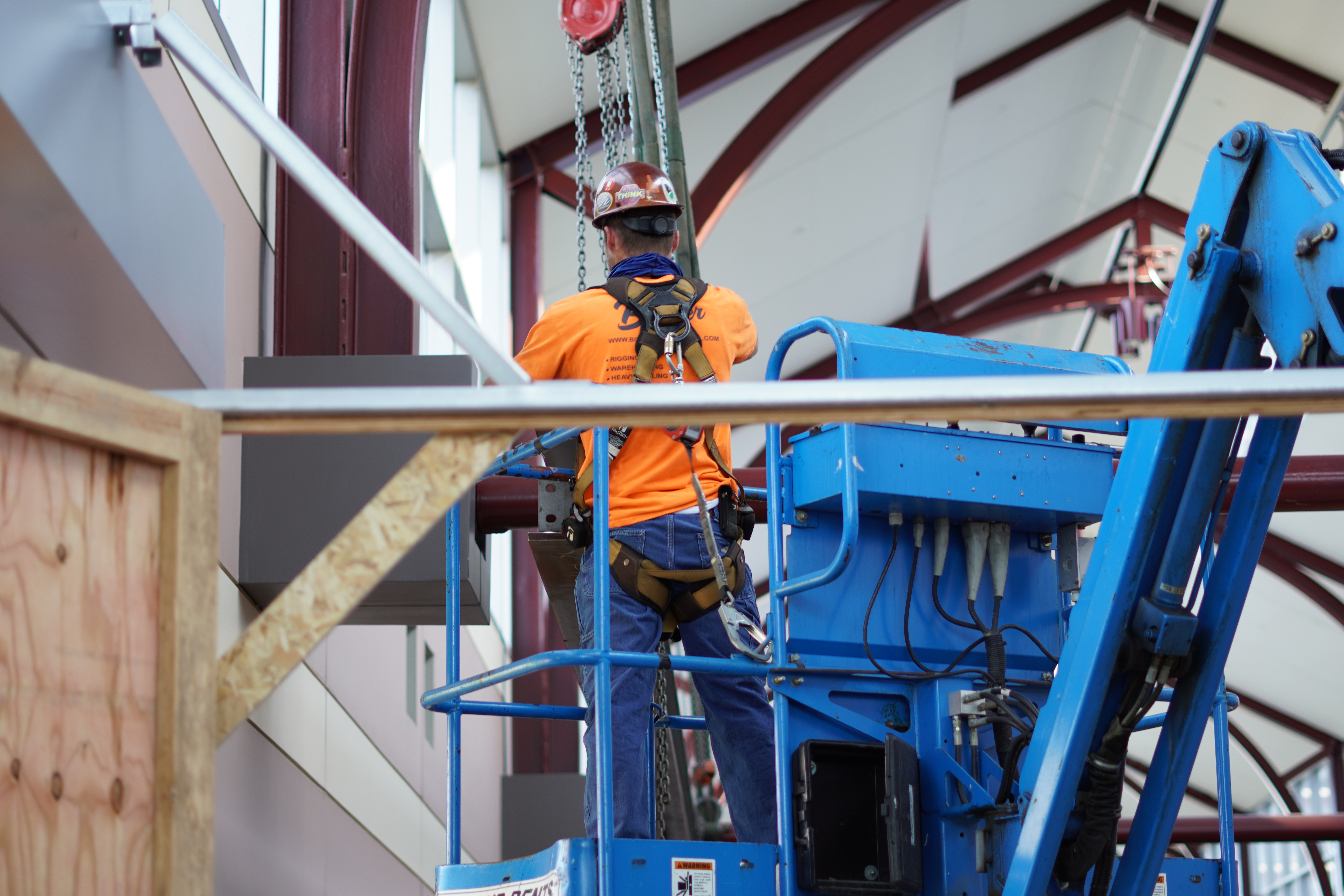 Installing chain falls to steel beams at The Joseph A. Floreano Convention Center