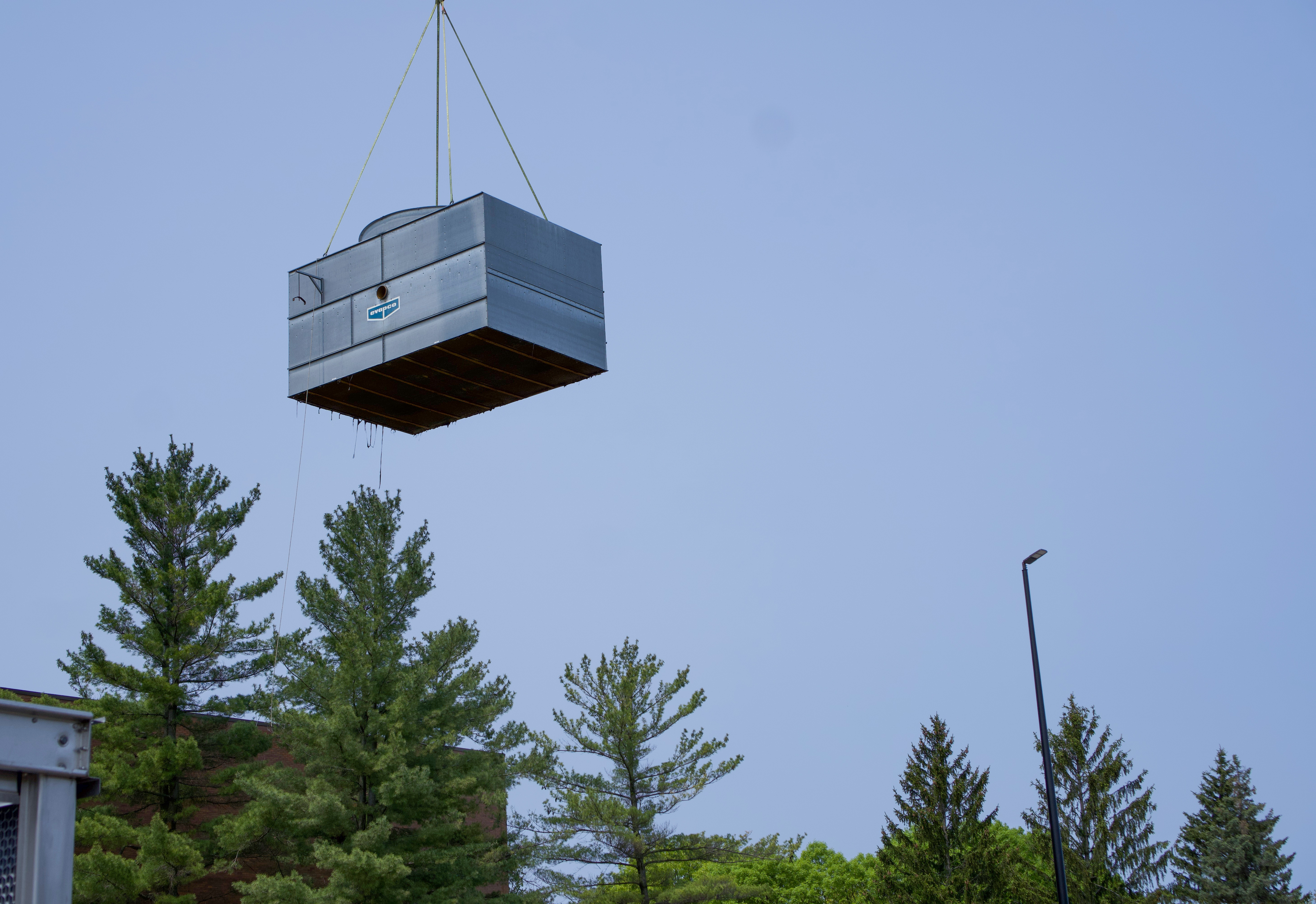 Old cooling tower unit being removed from RIT rooftop